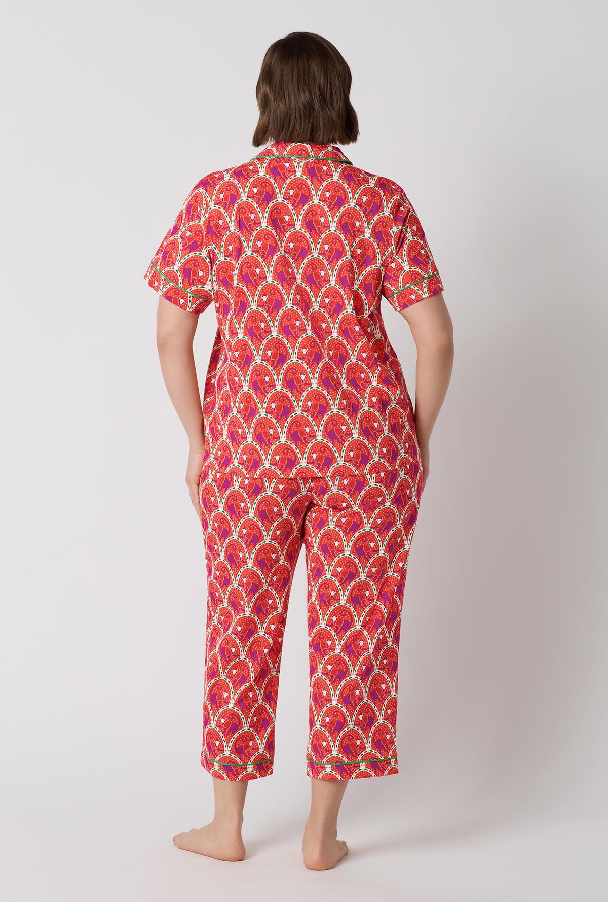 A Lady Wearing Plus Size Monkeying Around Short Sleeve Classic Stretch Jersey Cropped Pj Set in a back view pose