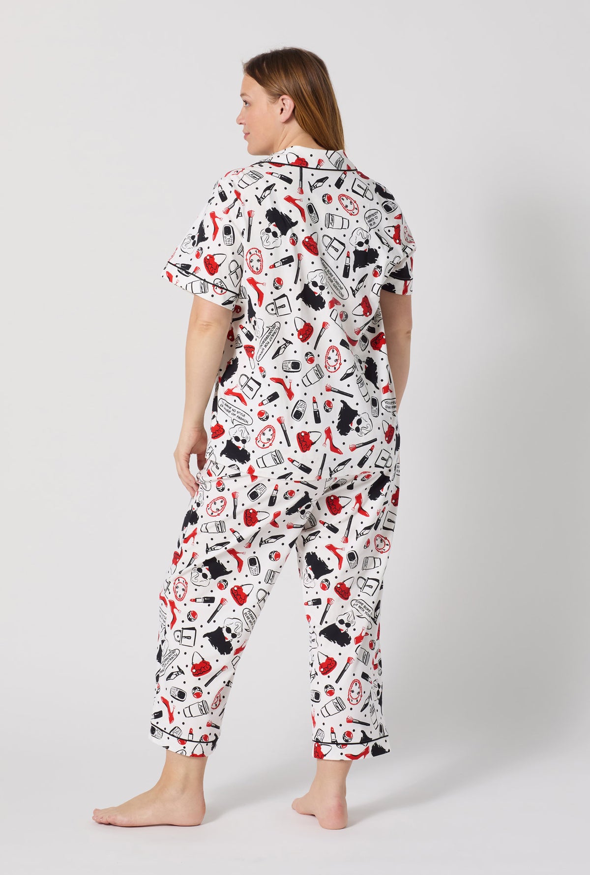 A lady wearing plus size Devil Wears Prada Short Sleeve Classic Stretch Jersey Cropped Pj Set back view
