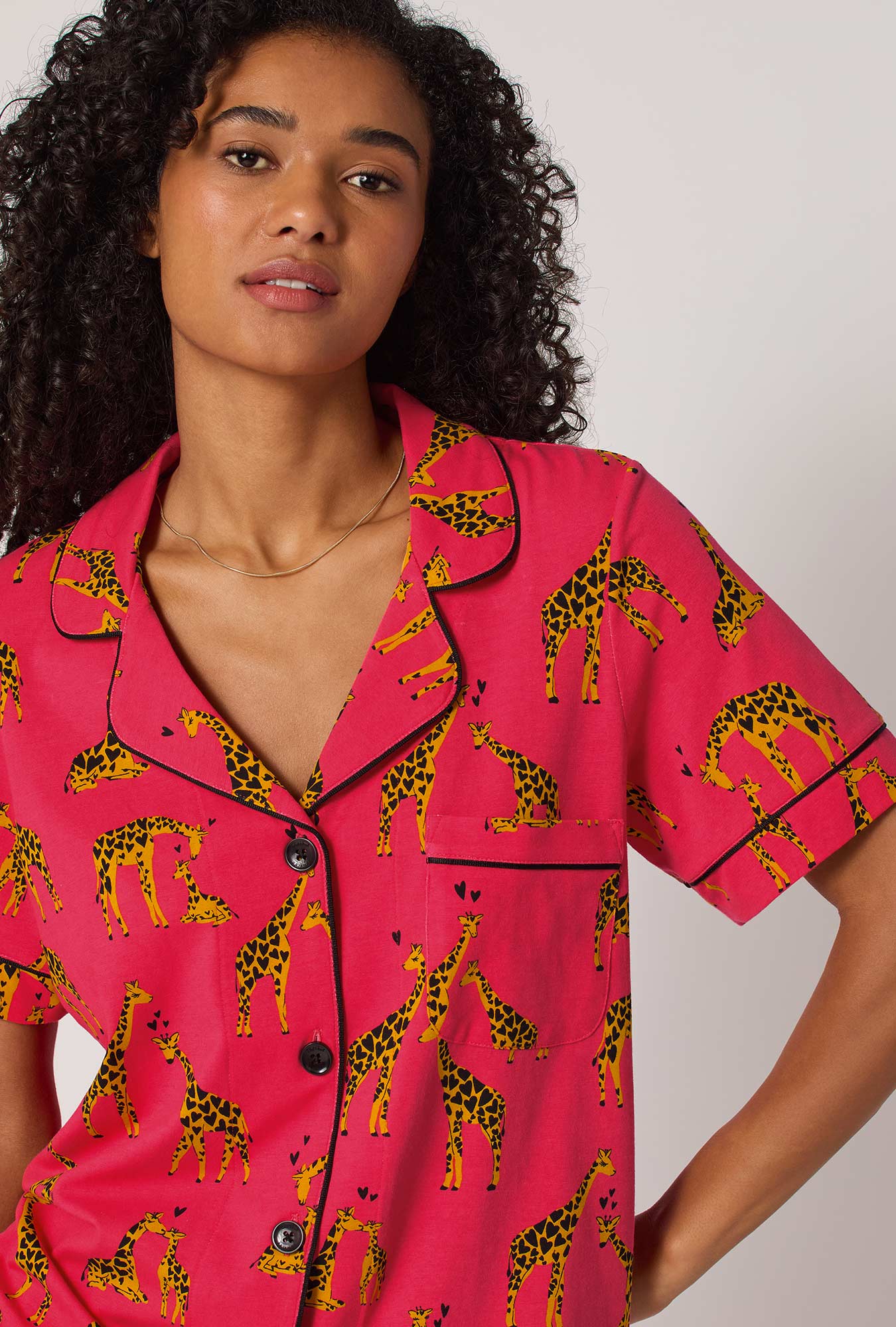 A lady wearing Giraffes In Love Short Sleeve Classic Stretch Jersey Cropped Pj Set
