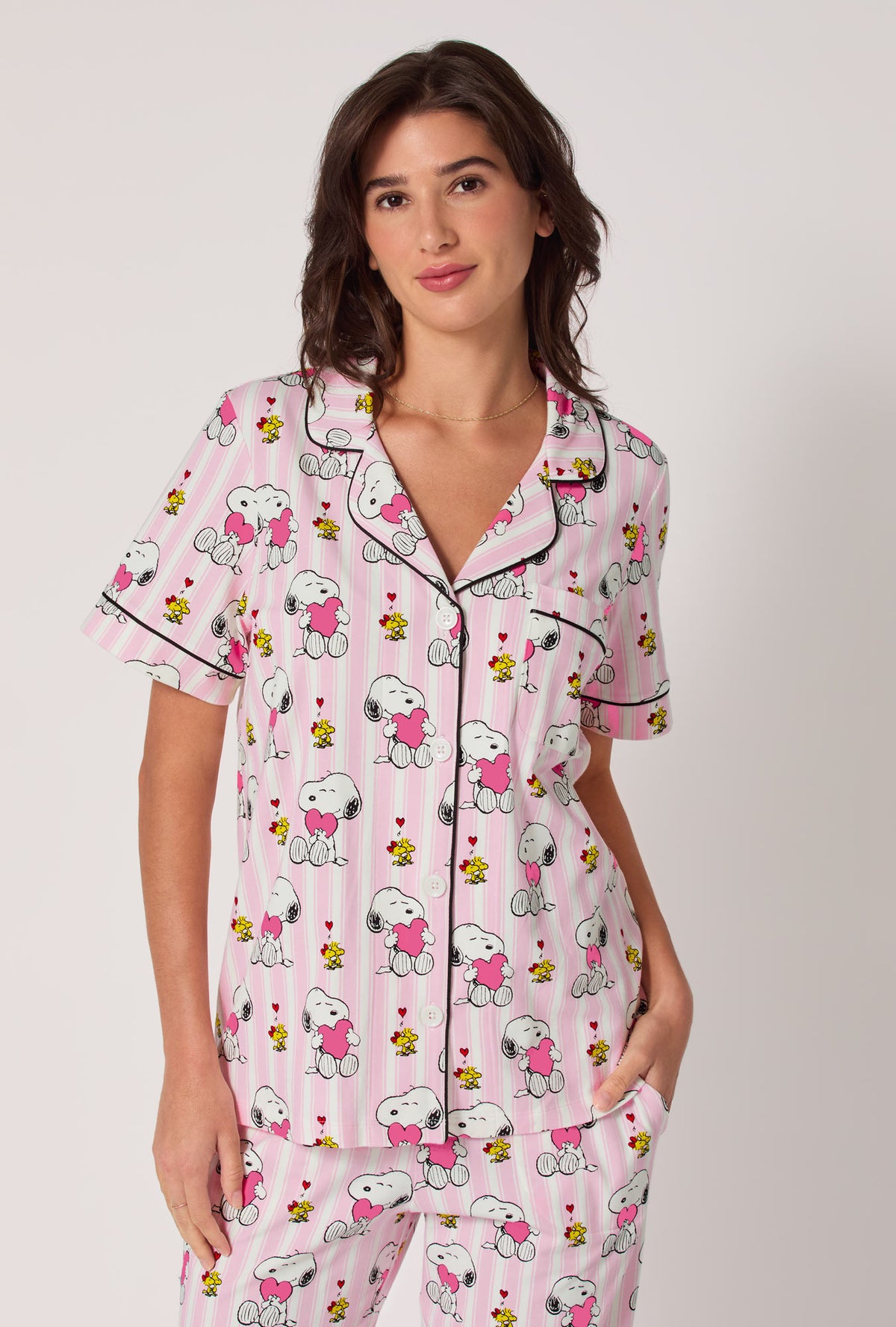 A lady wearing Snoopy's Valentine Short Sleeve Classic Stretch Jersey Cropped Pj Set