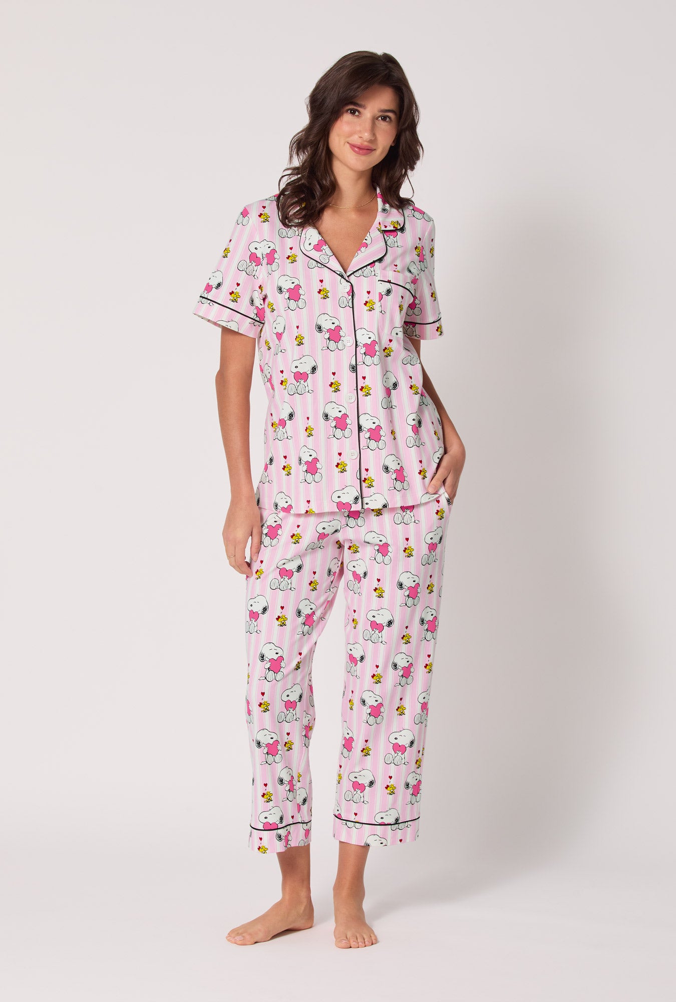 A lady wearing Snoopy's Valentine Short Sleeve Classic Stretch Jersey Cropped Pj Set