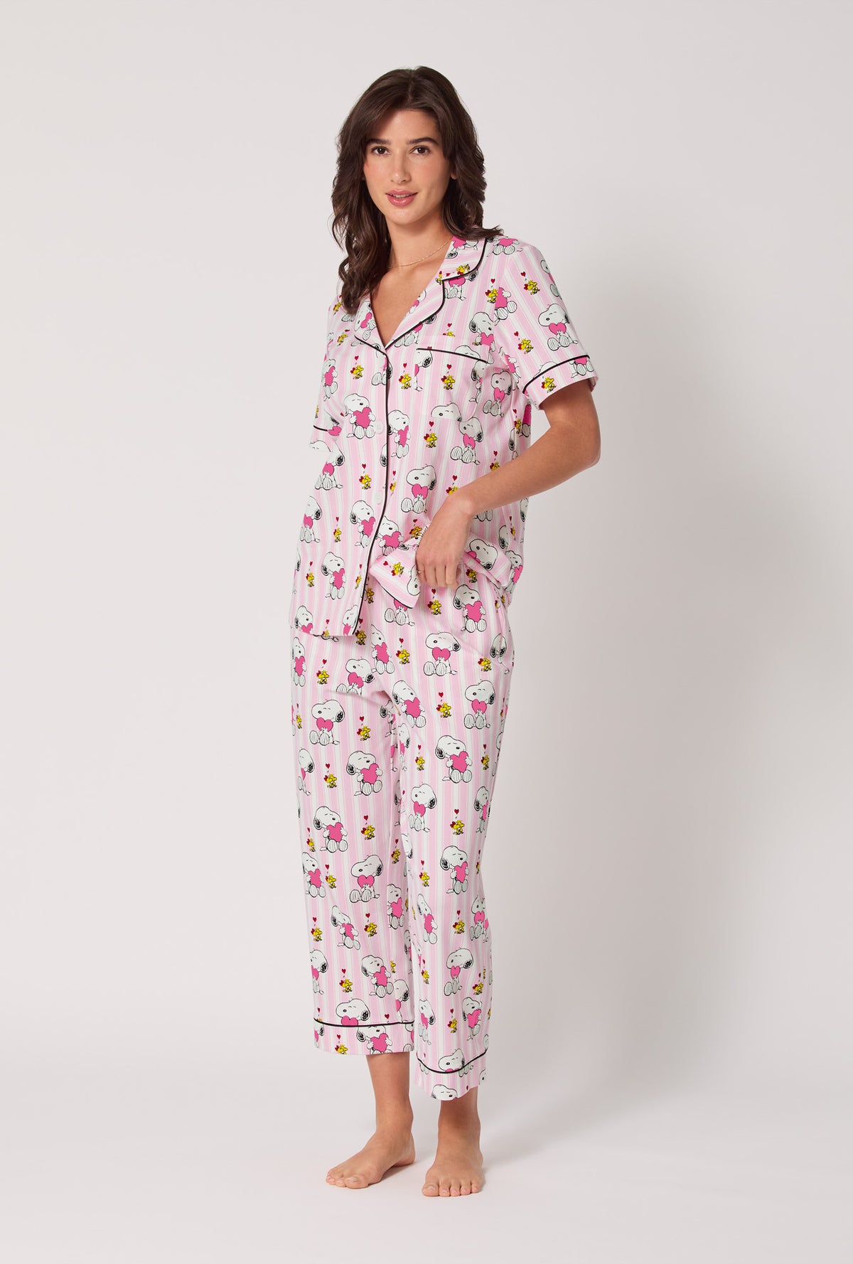 A lady wearing Snoopy's Valentine Short Sleeve Classic Stretch Jersey Cropped Pj Set