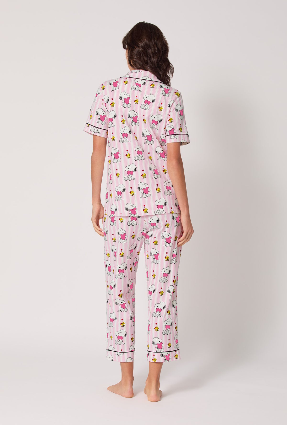A lady wearing Snoopy's Valentine Short Sleeve Classic Stretch Jersey Cropped Pj Set