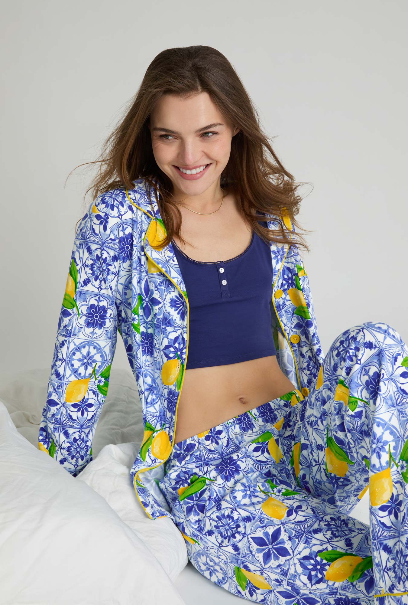 A closeup of A lady wearing Blue and  White Long Sleeve Classic Stretch Jersey Pj Set