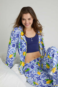 A closeup of A lady wearing Blue and  White Long Sleeve Classic Stretch Jersey Pj Set