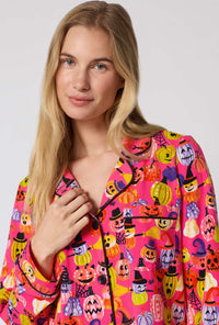 A Lady Wearing Pumpkin Patch Party Long Sleeve Classic Stretch Jersey Pj Set in a close up view pose