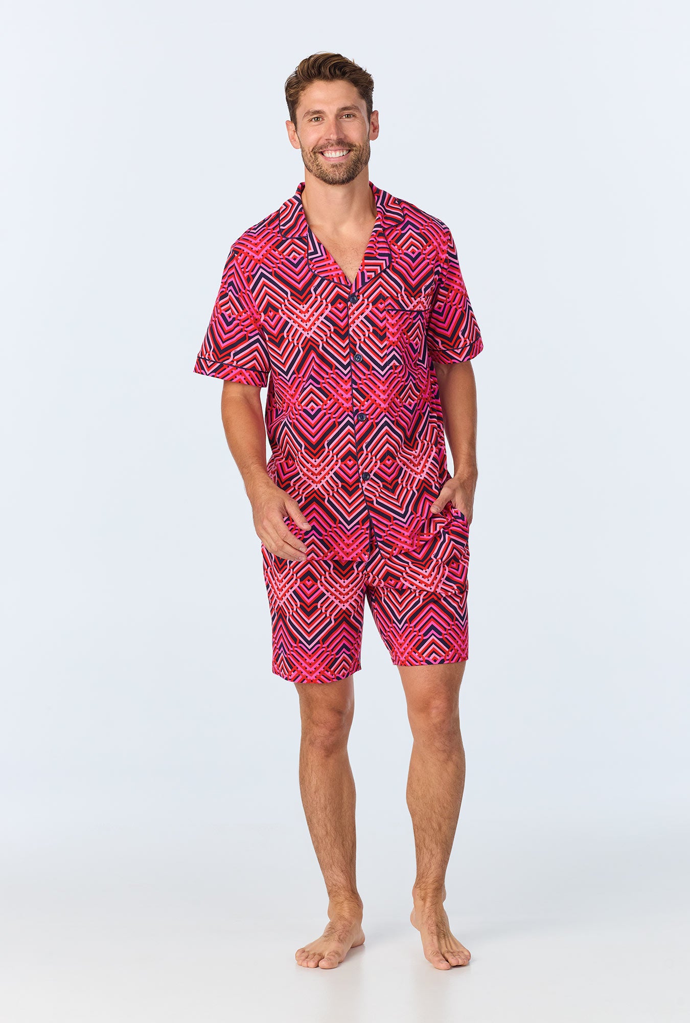 A man wearing Geo Trellis Men's Short Sleeve Notch Stretch Jersey Short PJ Set