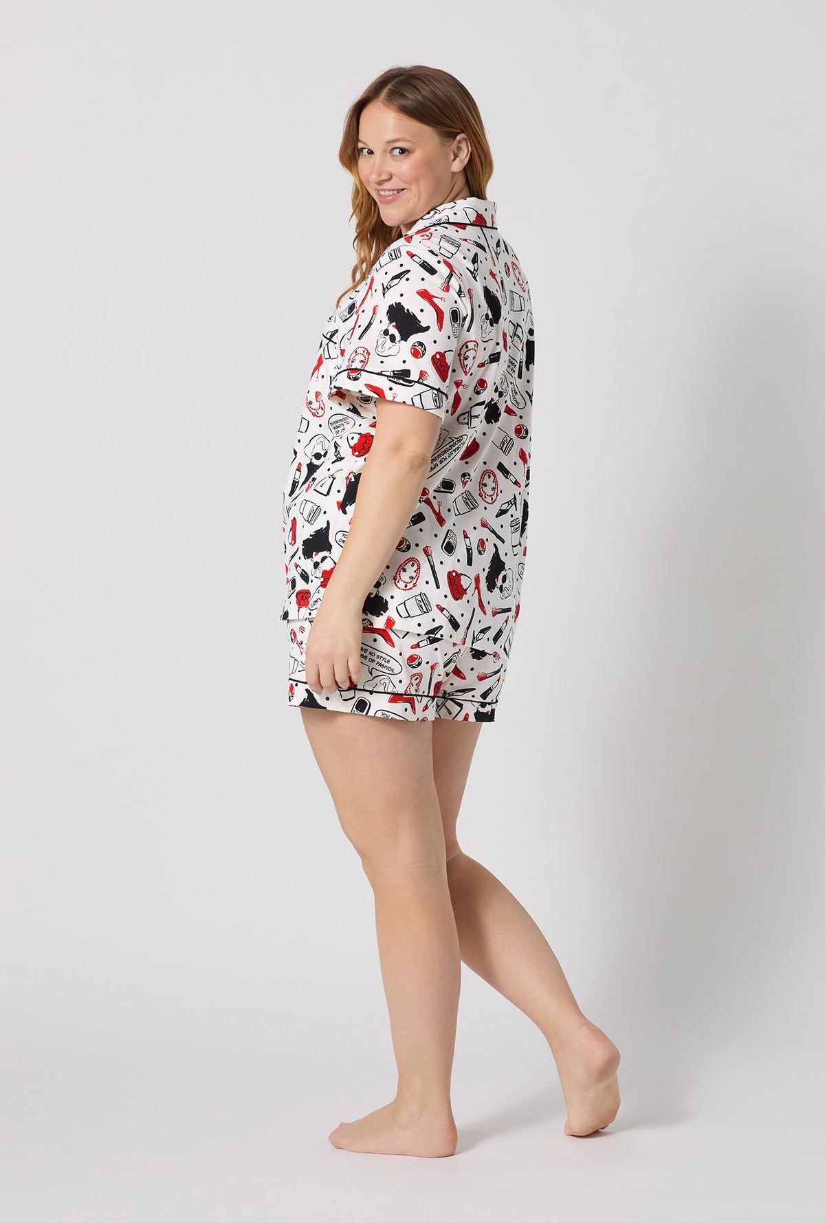 A lady wearing plus size Devil Wears Prada Short Sleeve Classic Shorty Stretch Jersey Pj Set back view
