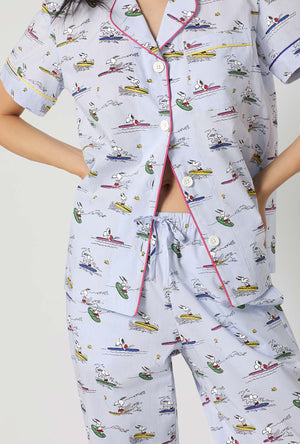 A lady wearing Catch A Wave Snoopy Short Sleeve Classic Woven Cotton Poplin Cropped Pj Set closer look