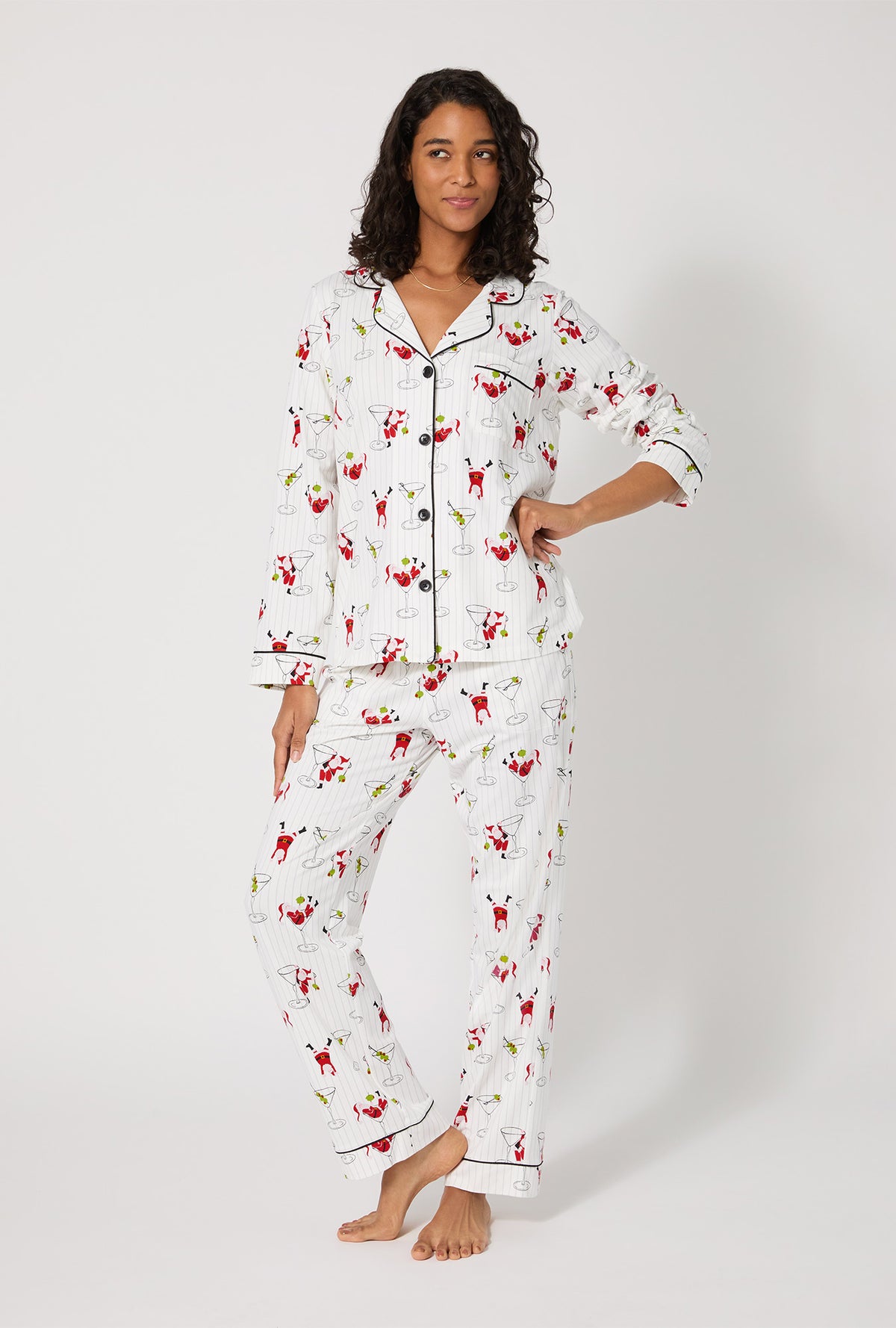 A lady wearing Tipsy Santa Long Sleeve Classic Stretch Jersey Pj Set