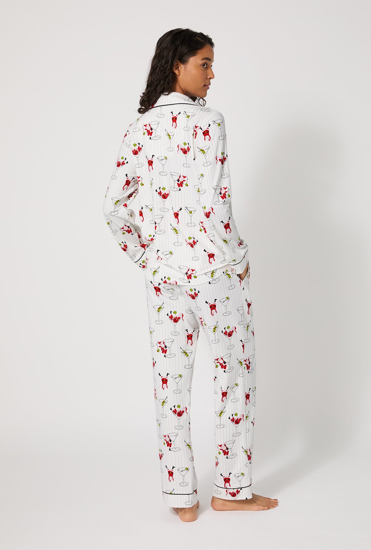 A lady wearing Tipsy Santa Long Sleeve Classic Stretch Jersey Pj Set