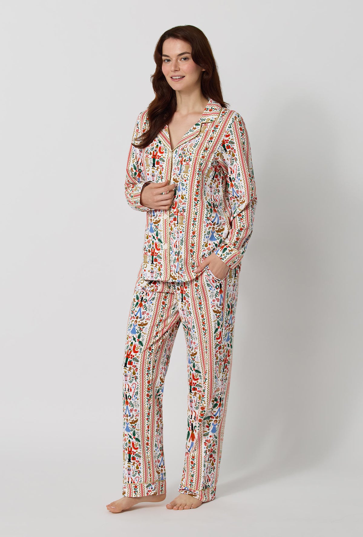 A lady wearing Rifle Paper Co. x BedHead PJs Holly Jolly Nutcracker Long Sleeve Classic Stretch Jersey Pj Set