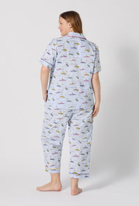 A lady wearing plus size Catch A Wave Snoopy Short Sleeve Classic Woven Cotton Poplin Cropped Pj Set back view