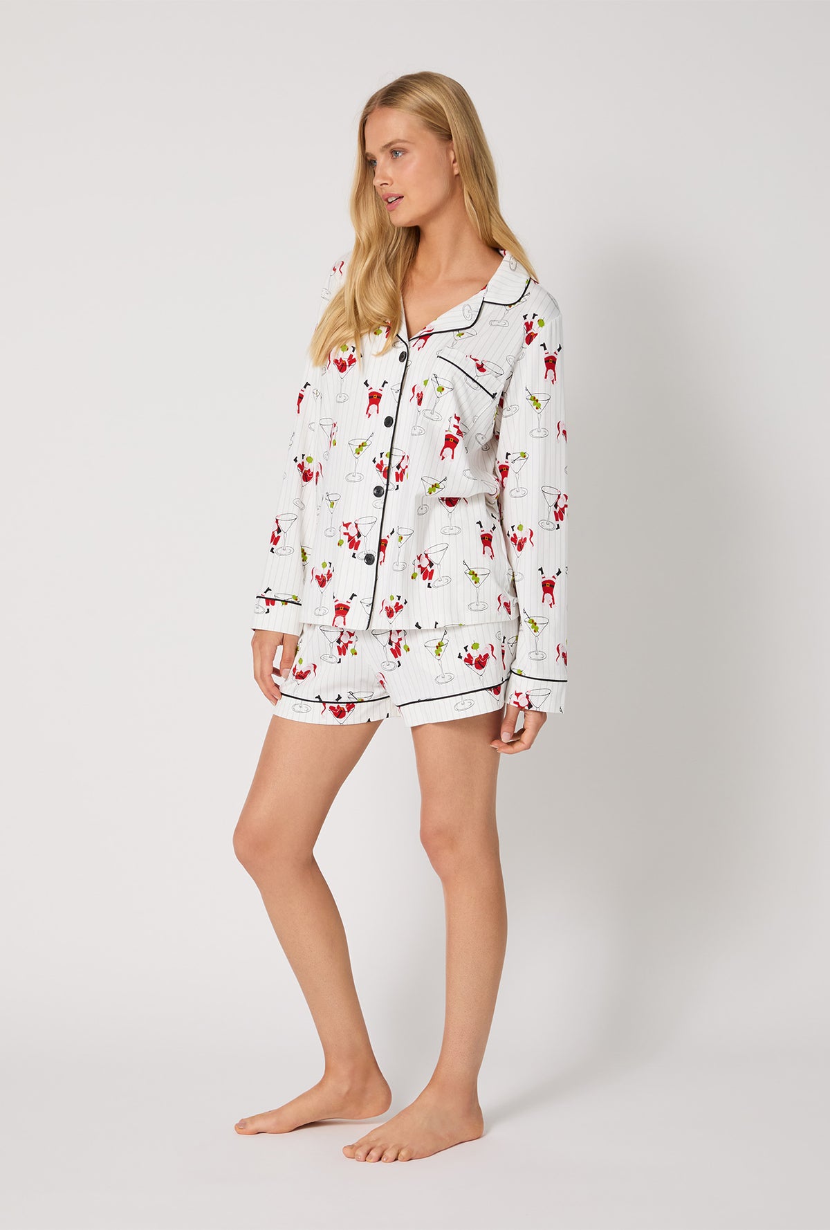 A lady wearing Tipsy Santa Long Sleeve Classic Stretch Jersey Shorty Pj Set