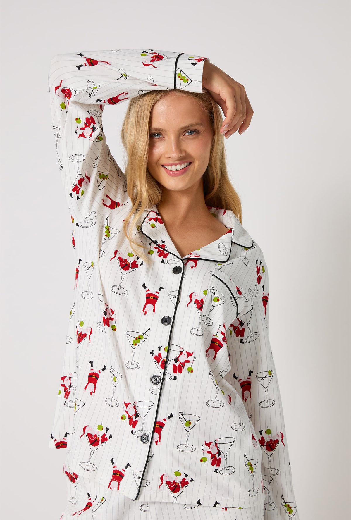 A lady wearing Tipsy Santa Long Sleeve Classic Stretch Jersey Shorty Pj Set