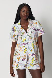 A closeup of A lady wearing Blue Short Sleeve Classic Shorty Stretch Jersey Pj Set