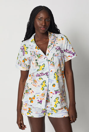 A closeup of A lady wearing Blue Short Sleeve Classic Shorty Stretch Jersey Pj Set