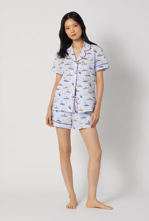 A lady wearing Catch A Wave, Snoopy Short Sleeve Classic Woven Cotton Poplin Shorty Pj Set looking front