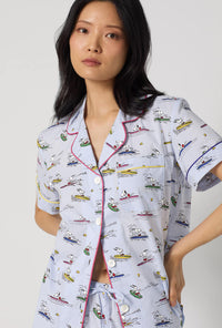 A lady wearing Catch A Wave, Snoopy Short Sleeve Classic Woven Cotton Poplin Shorty Pj Set closer look