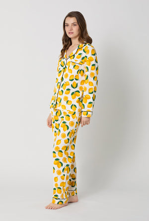A lady wearing White and  Yellow Long Sleeve Classic Stretch Jersey Pj Set back view