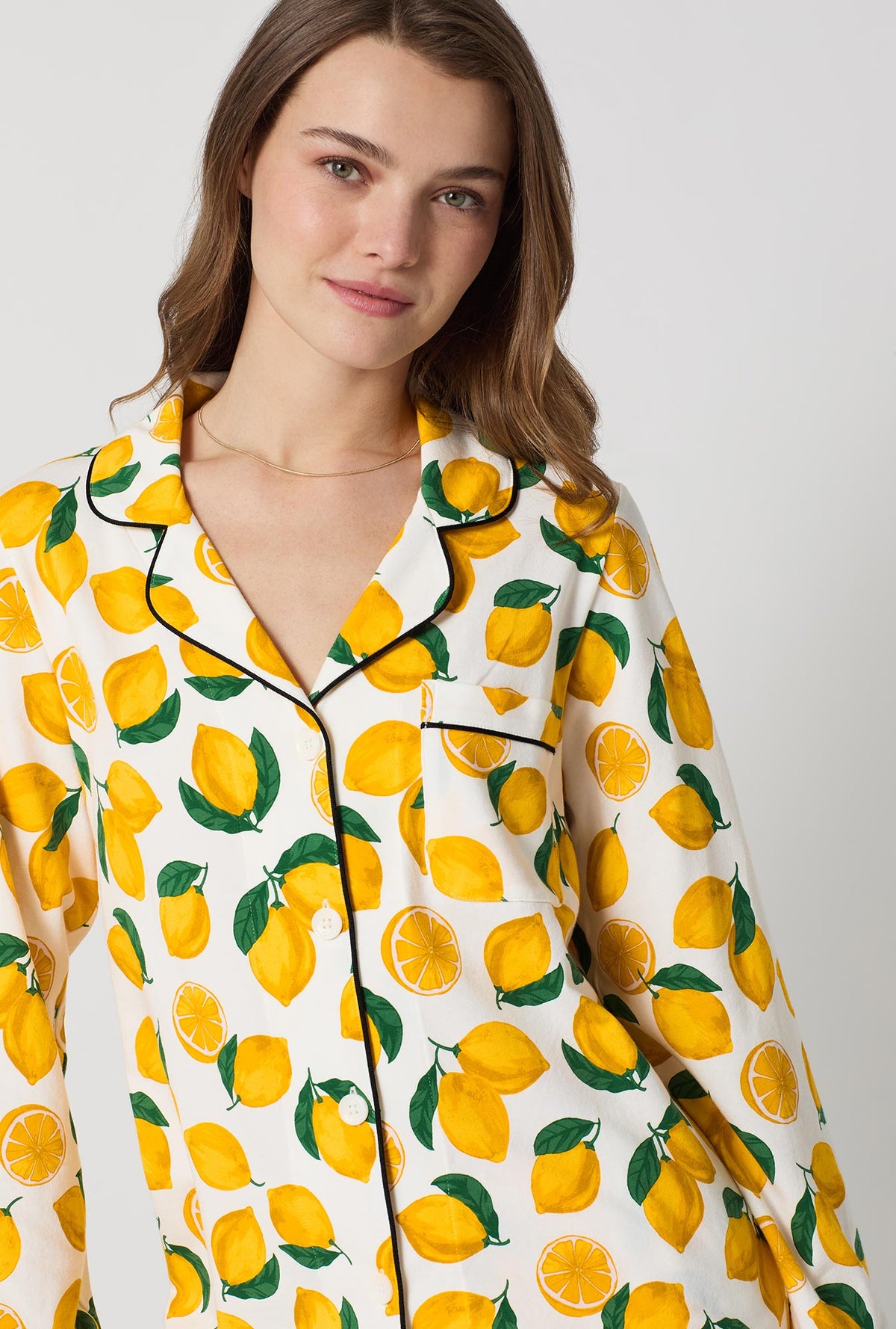 A lady wearing White and  Yellow Long Sleeve Classic Stretch Jersey Pj Set side view