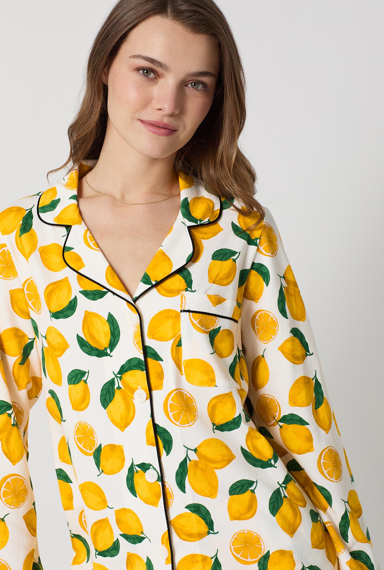 A lady wearing White and  Yellow Long Sleeve Classic Stretch Jersey Pj Set side view