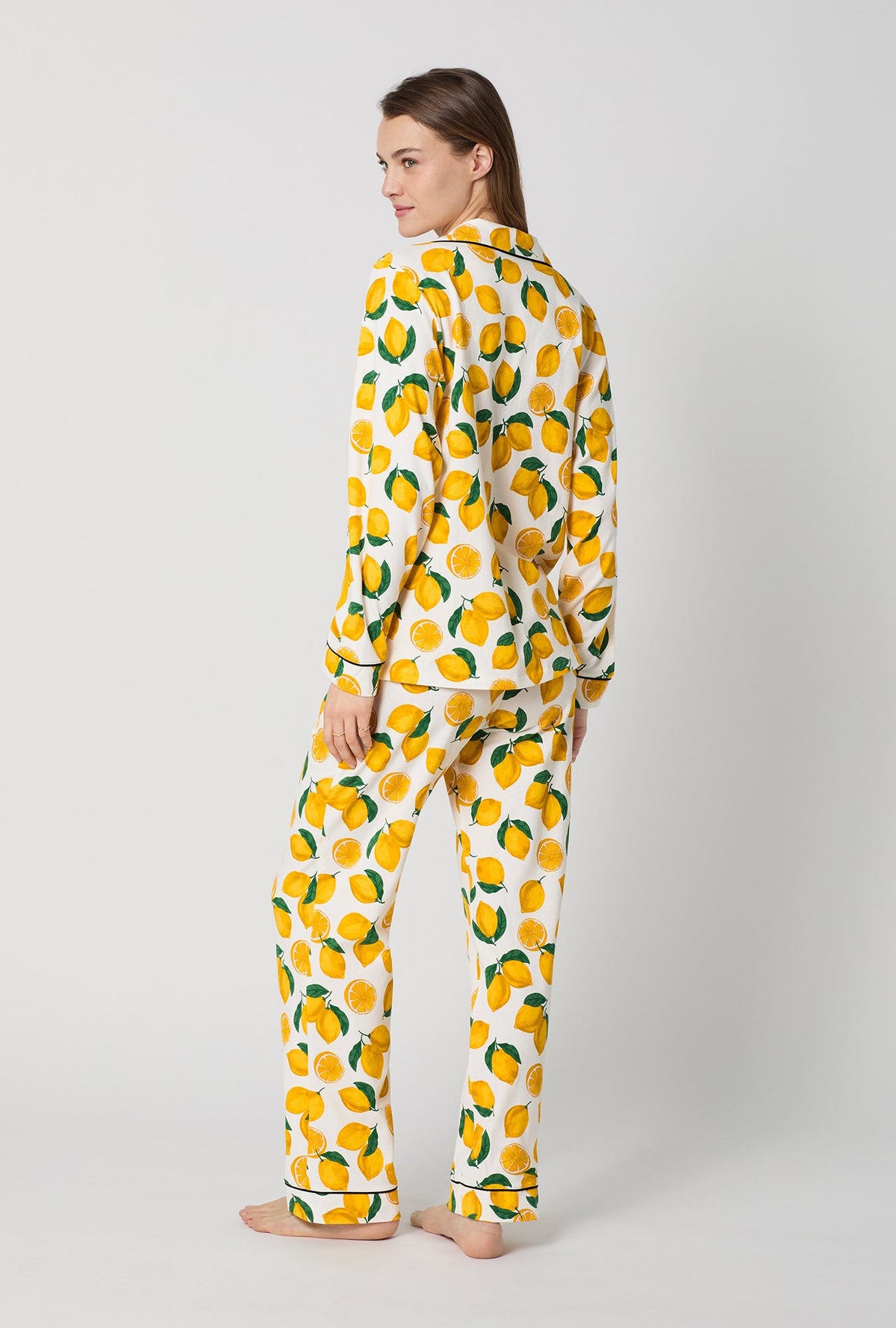 A closeup of A lady wearing White and  Yellow Long Sleeve Classic Stretch Jersey Pj Set