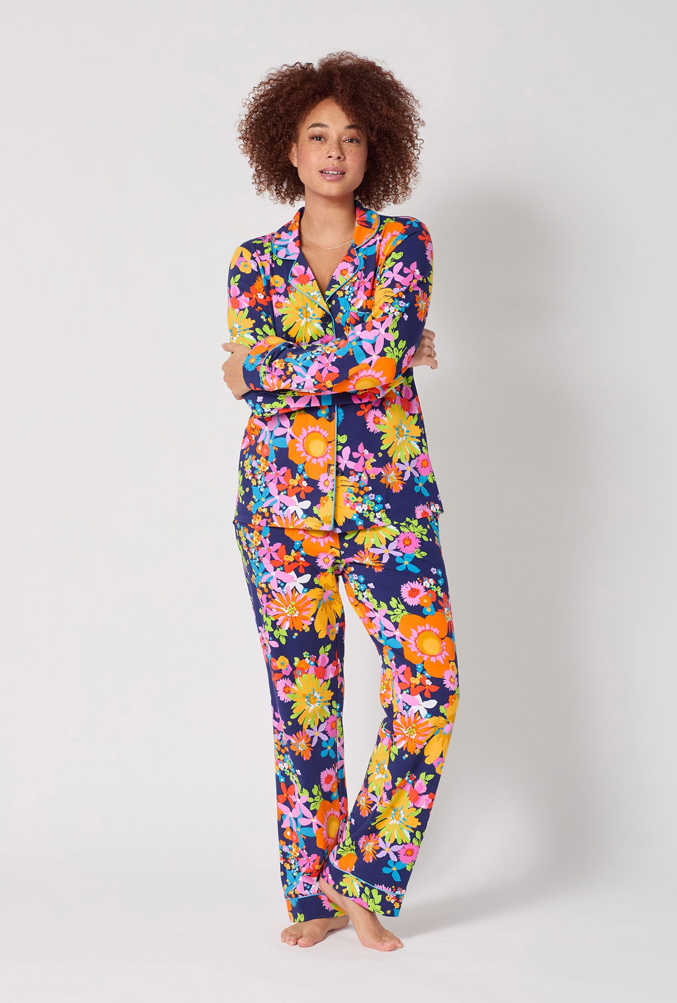 A lady wearing BedHead x Trina Turk Bay Street Bloom Long Sleeve Classic Stretch Jersey Pj Set
