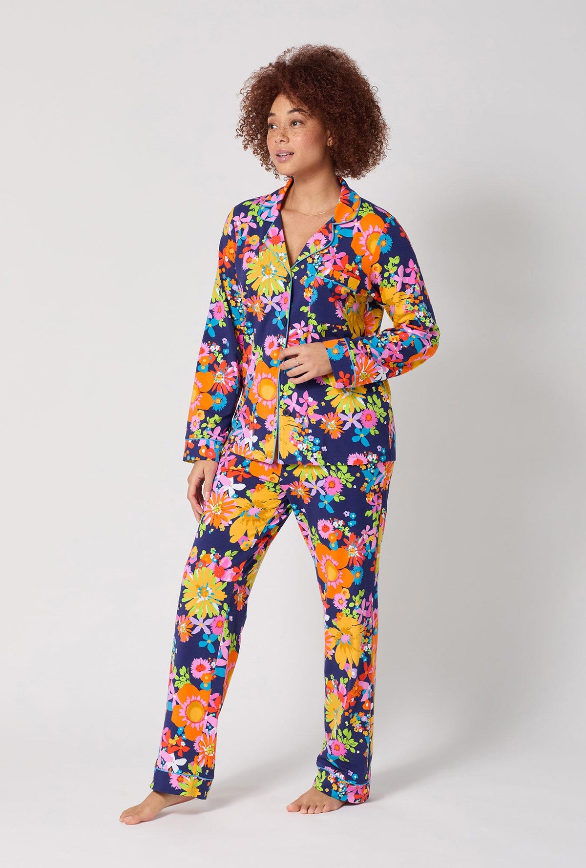 A lady wearing BedHead x Trina Turk Bay Street Bloom Long Sleeve Classic Stretch Jersey Pj Set