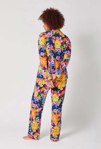 A lady wearing BedHead x Trina Turk Bay Street Bloom Long Sleeve Classic Stretch Jersey Pj Set