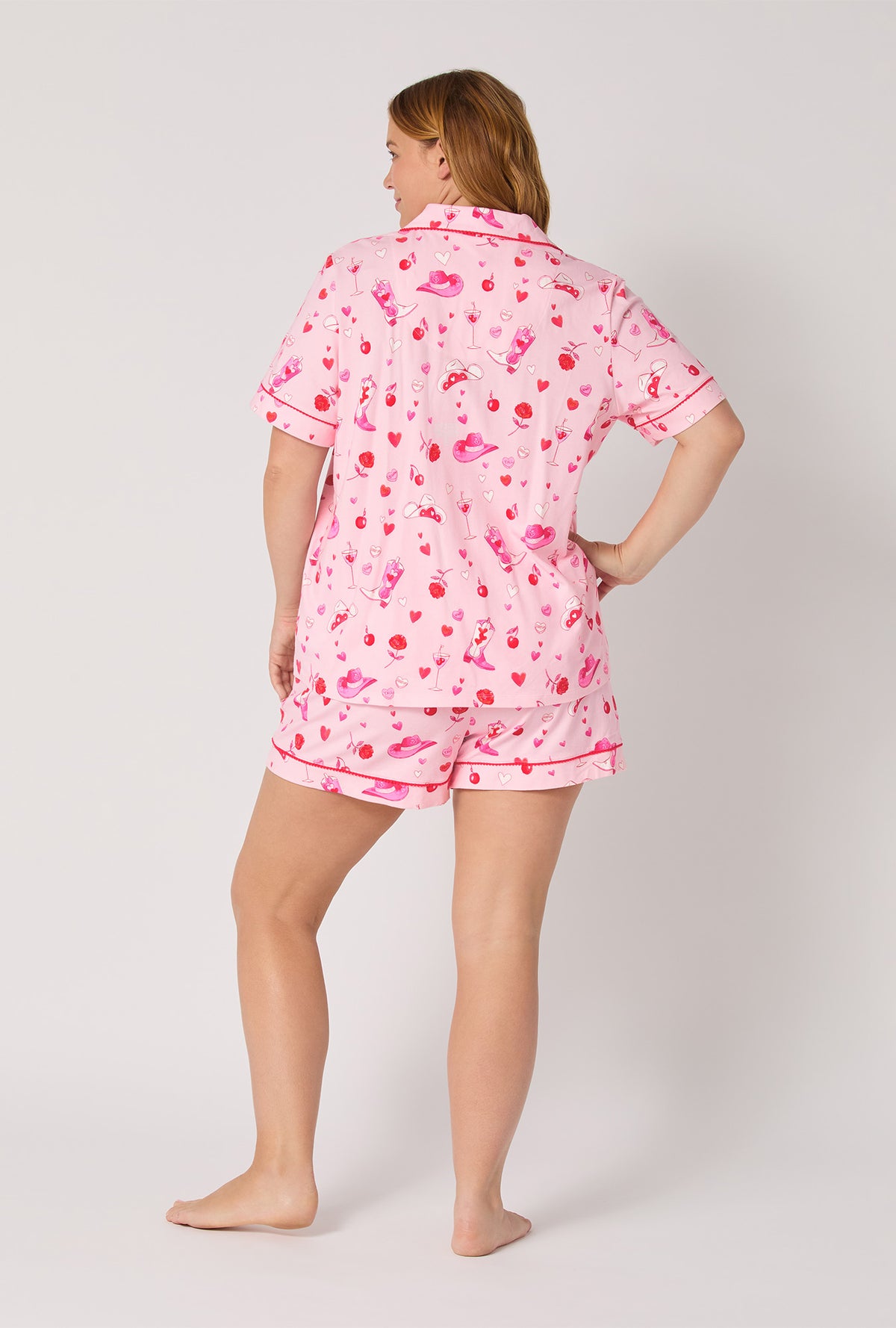 A lady wearing Giddy Up Galentine Short Sleeve Classic Shorty Stretch Jersey Pj Set