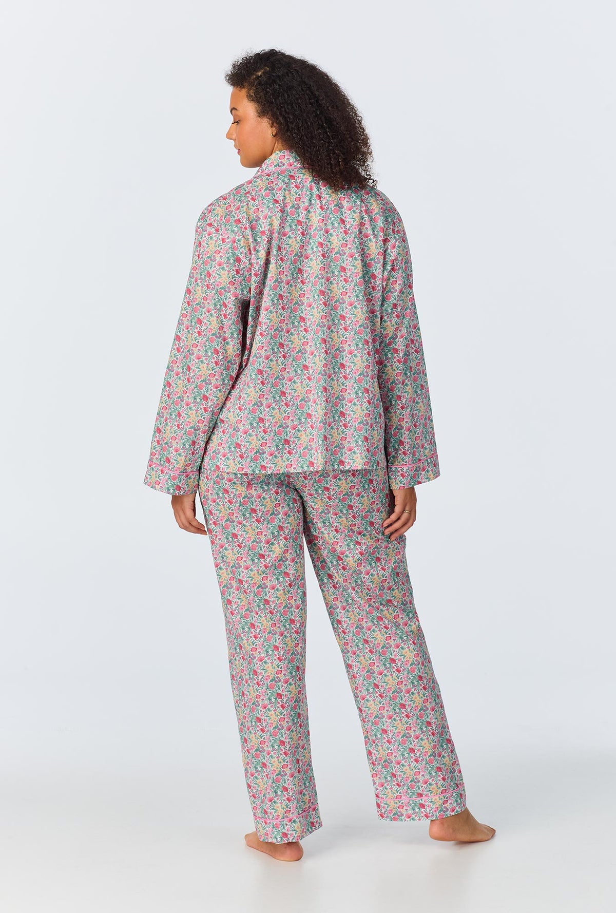 A lady wearing Florence May Long Sleeve Classic Woven Cotton Tana Lawn Long PJ Set Made with Liberty Fabrics