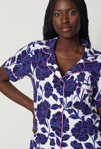 A closeup of A lady wearing Blue and  White Short Sleeve Classic Shorty Stretch Jersey Pj Set