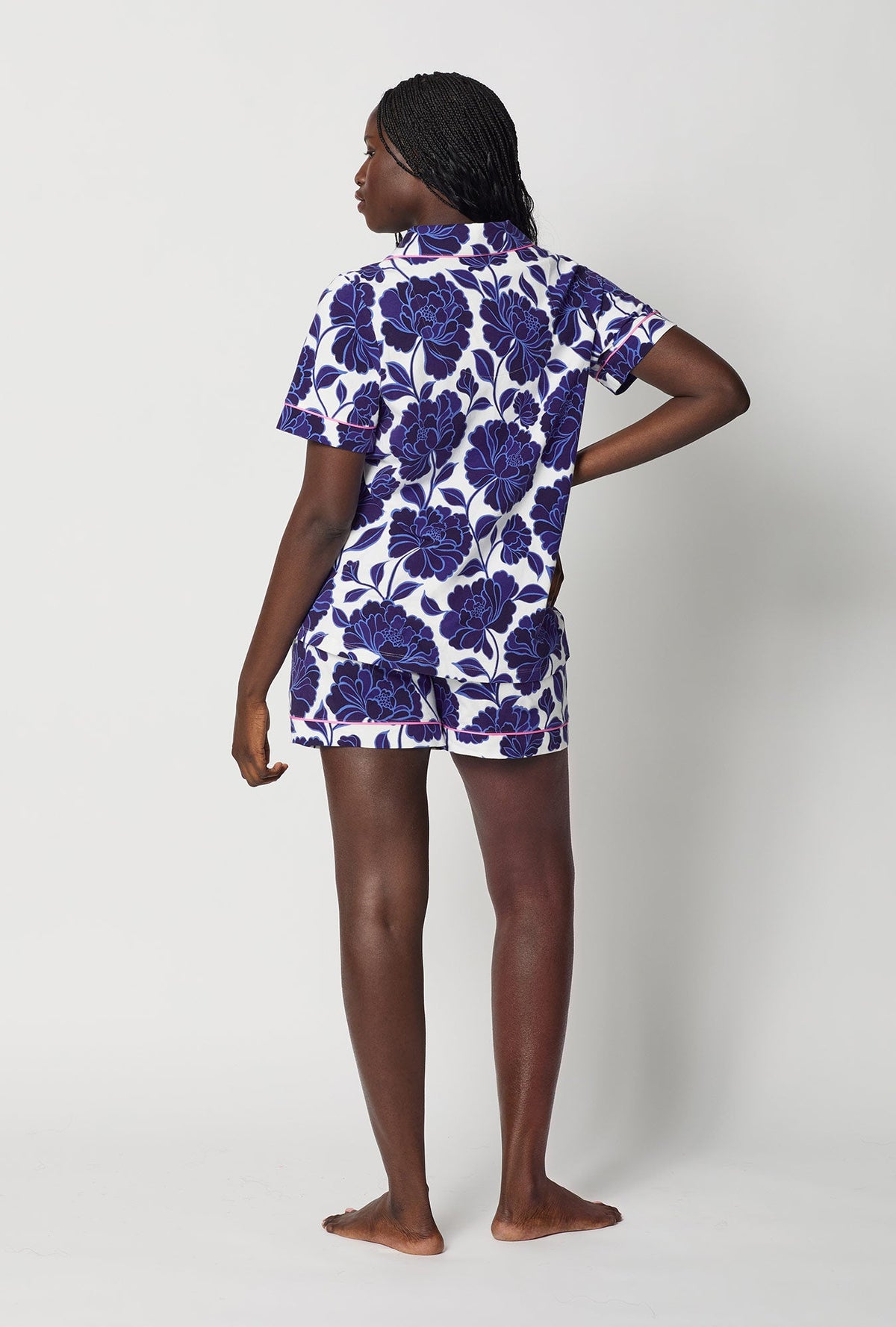A lady wearing Blue and  White Short Sleeve Classic Shorty Stretch Jersey Pj Set back view