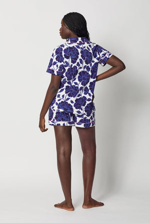 A lady wearing Blue and  White Short Sleeve Classic Shorty Stretch Jersey Pj Set back view