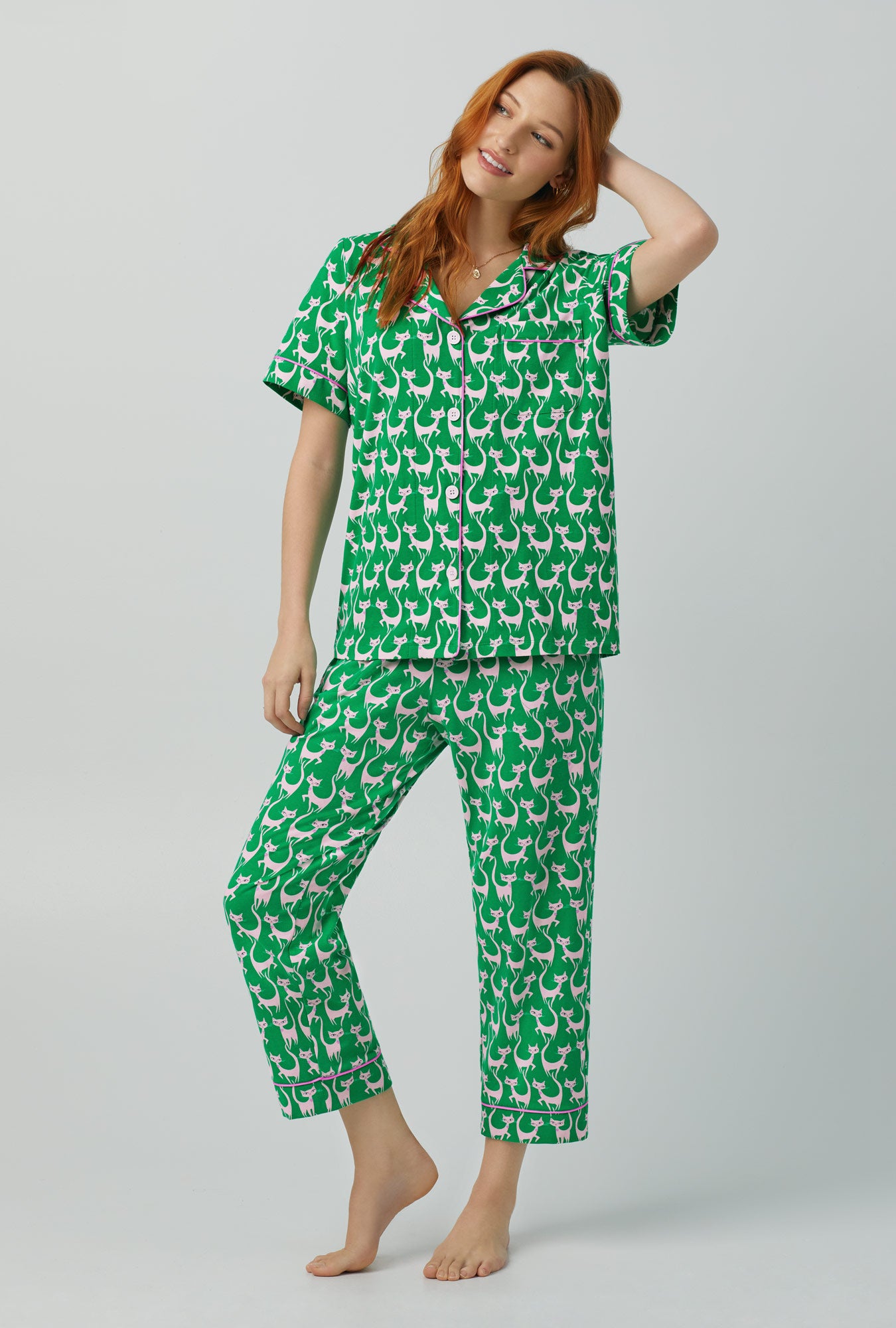 A lady wearing green Short Sleeve Classic Stretch Jersey Cropped with Cool Cats  print