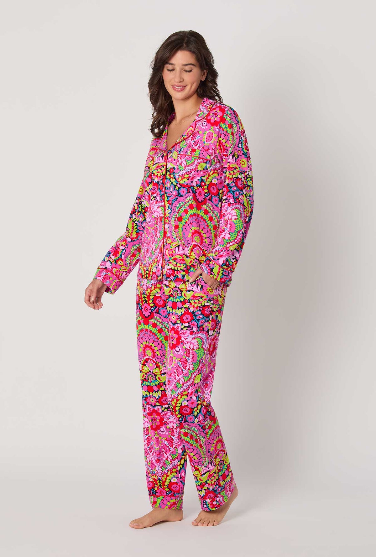 A lady wearing BedHead x Trina Turk Las Flores Long Sleeve Classic Stretch Jersey Pj Set