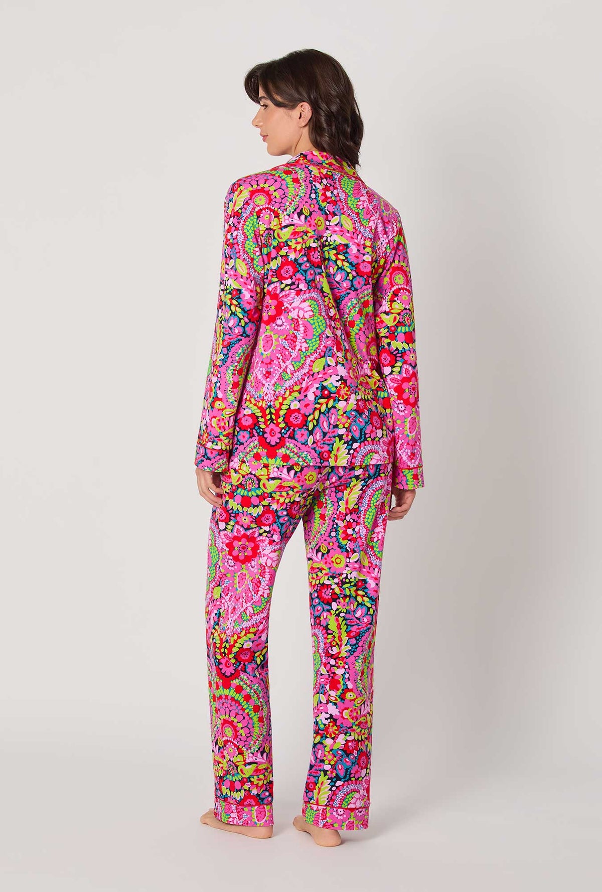 A lady wearing BedHead x Trina Turk Las Flores Long Sleeve Classic Stretch Jersey Pj Set