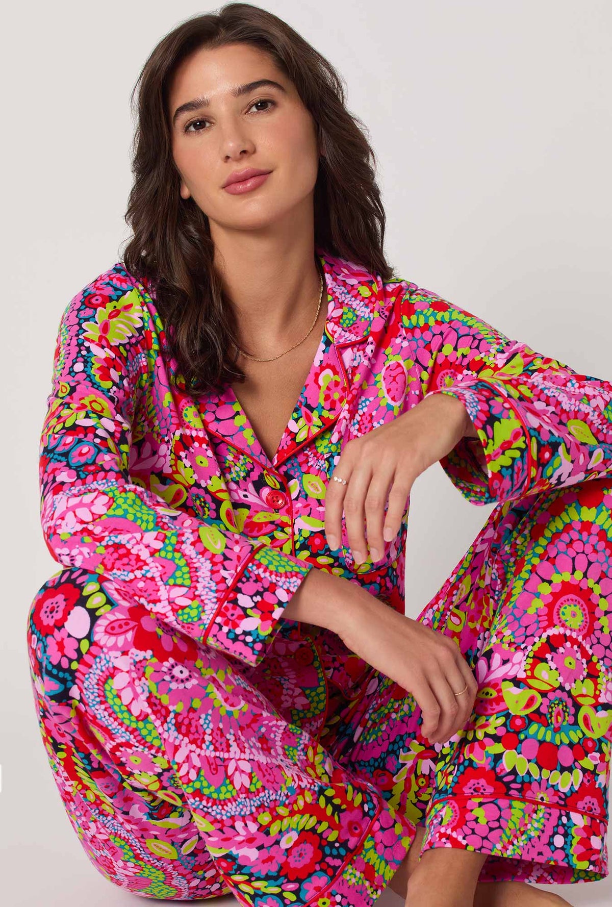 A lady wearing BedHead x Trina Turk Las Flores Long Sleeve Classic Stretch Jersey Pj Set
