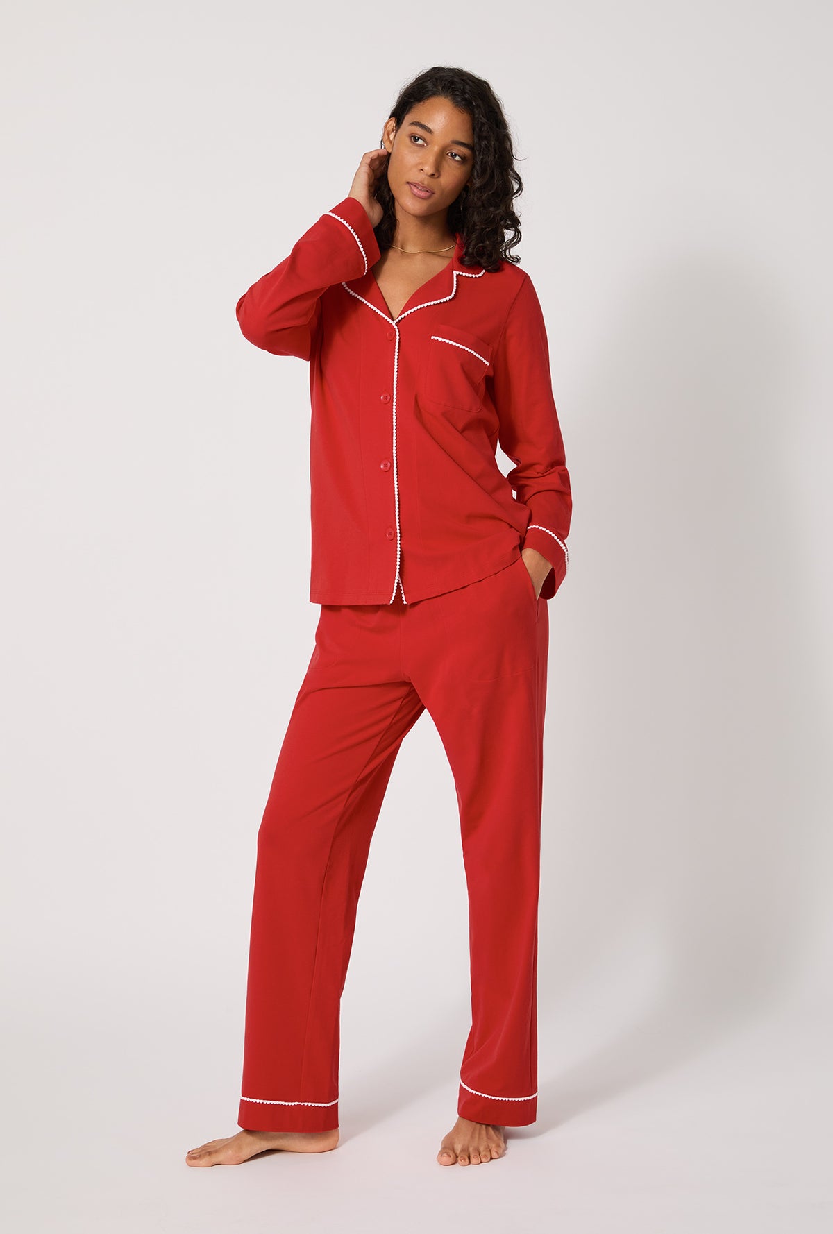A lady wearing Mars Red Long Sleeve Classic Stretch Jersey Pj Set