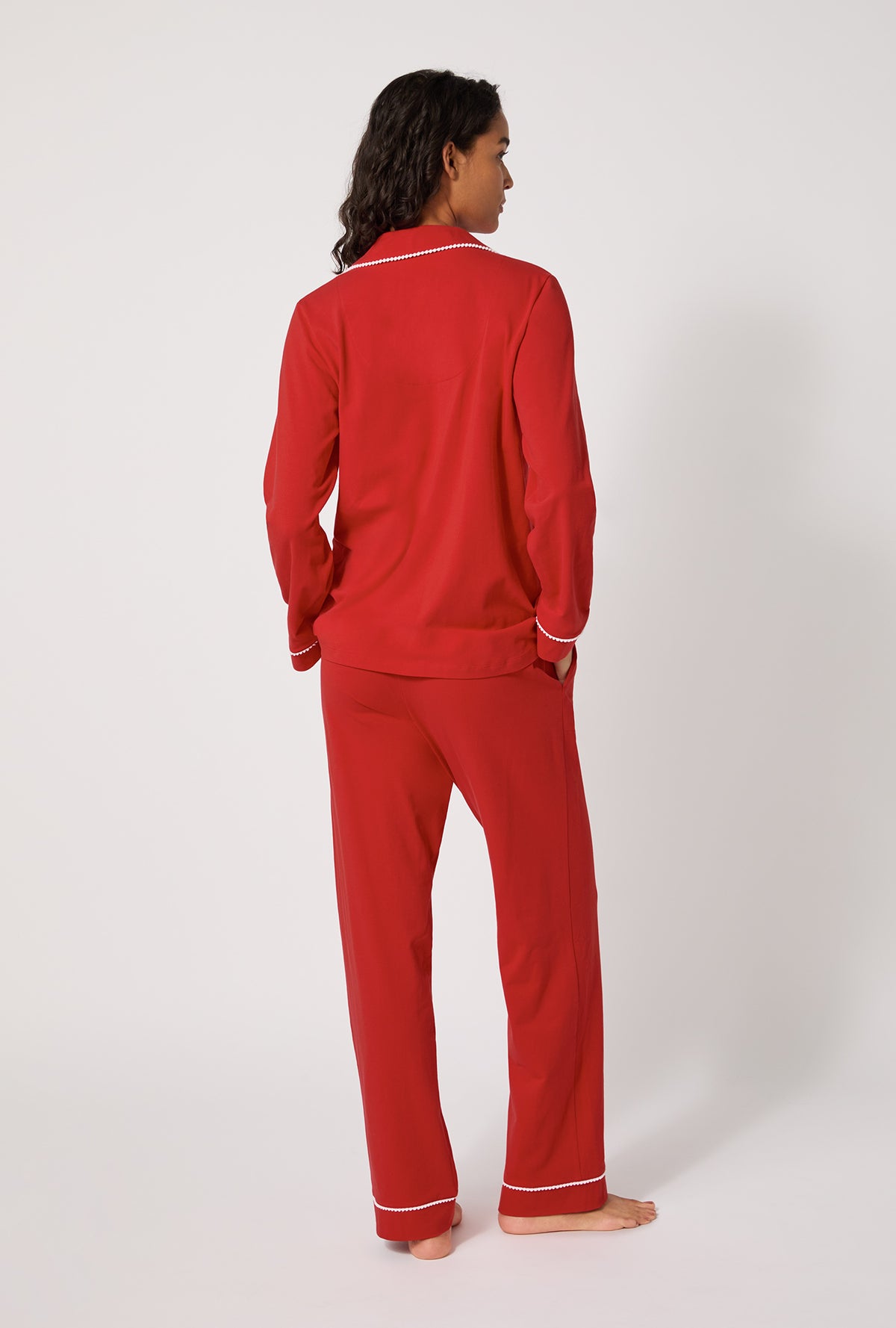 A lady wearing Mars Red Long Sleeve Classic Stretch Jersey Pj Set