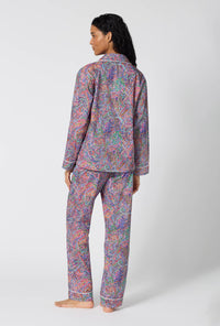A Lady Wearing Dana Sharmin Long Sleeve Classic Woven Tana Lawn® Pj Set Made With Liberty Fabrics in a back view pose