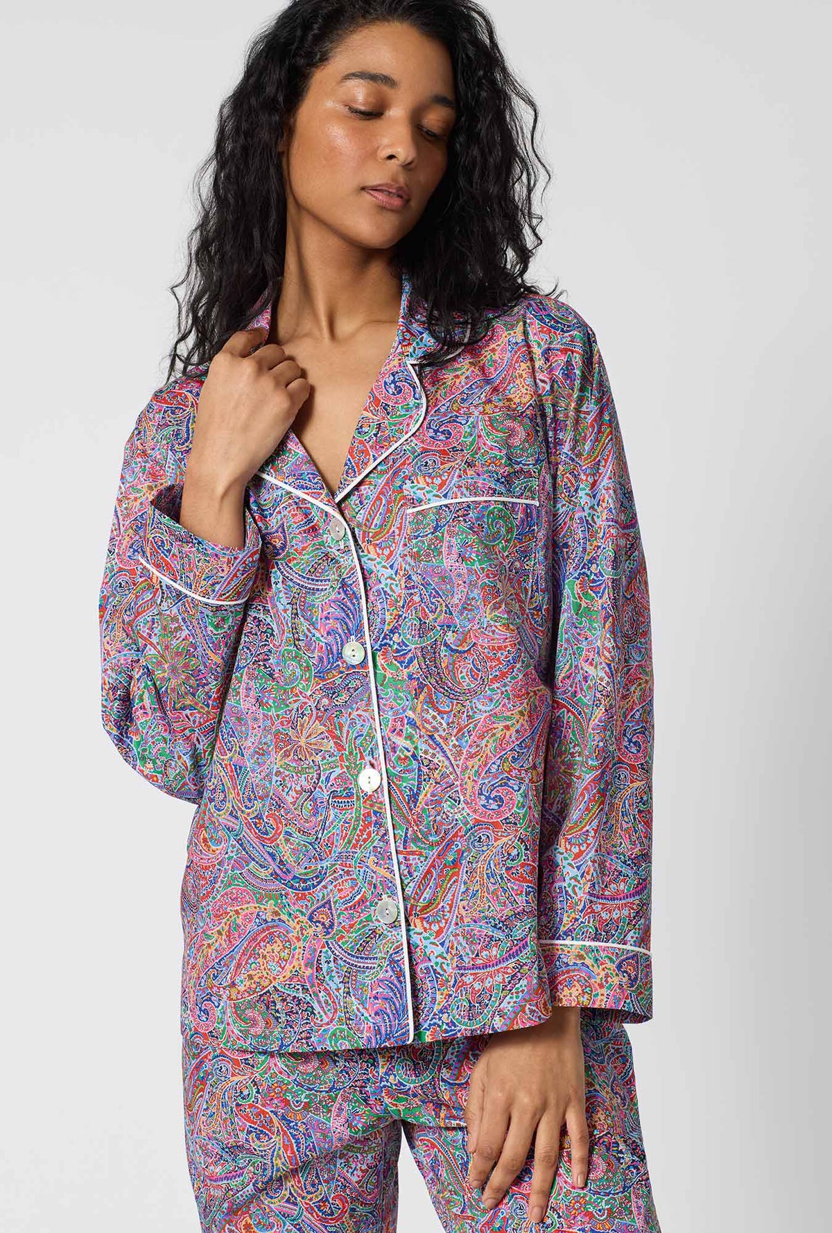 A Lady Wearing Dana Sharmin Long Sleeve Classic Woven Tana Lawn® Pj Set Made With Liberty Fabrics in a front close up shot
