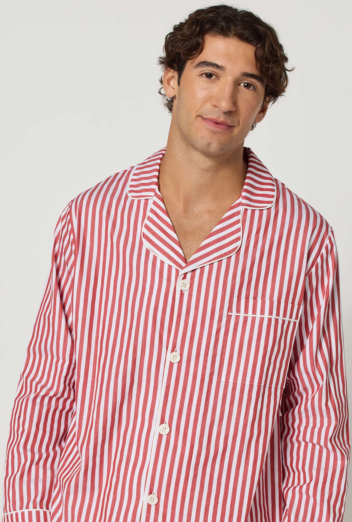 A man wearing Red Signature Stripe Men's Long Sleeve Classic Woven Cotton Sateen Pj Set closer look