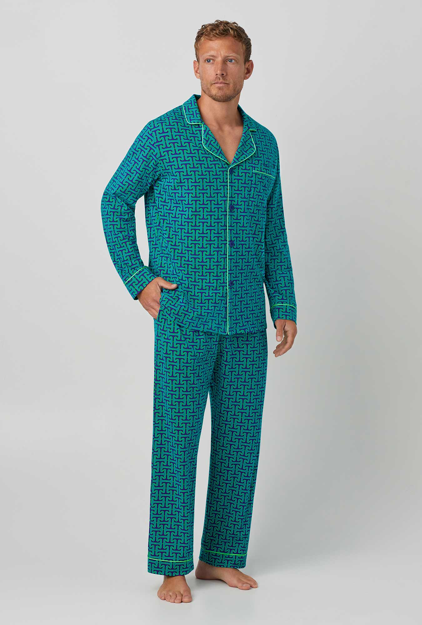 A man wearing green Long Sleeve Classic Stretch Jersey PJ Set with Tile Mens Henle print