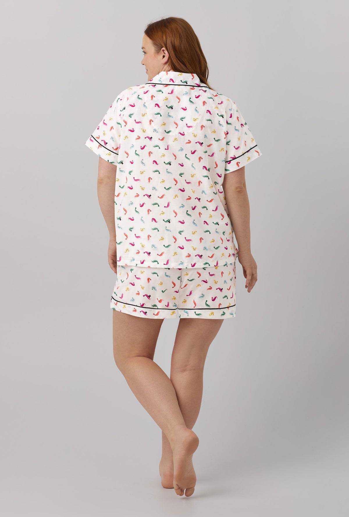 A lady wearing Short Sleeve Classic Woven Cotton Silk PJ Set with Shrimply The Best print