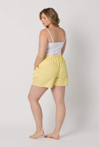 A lady wearing plus size Yellow Cotton Sateen Boxer Short back view