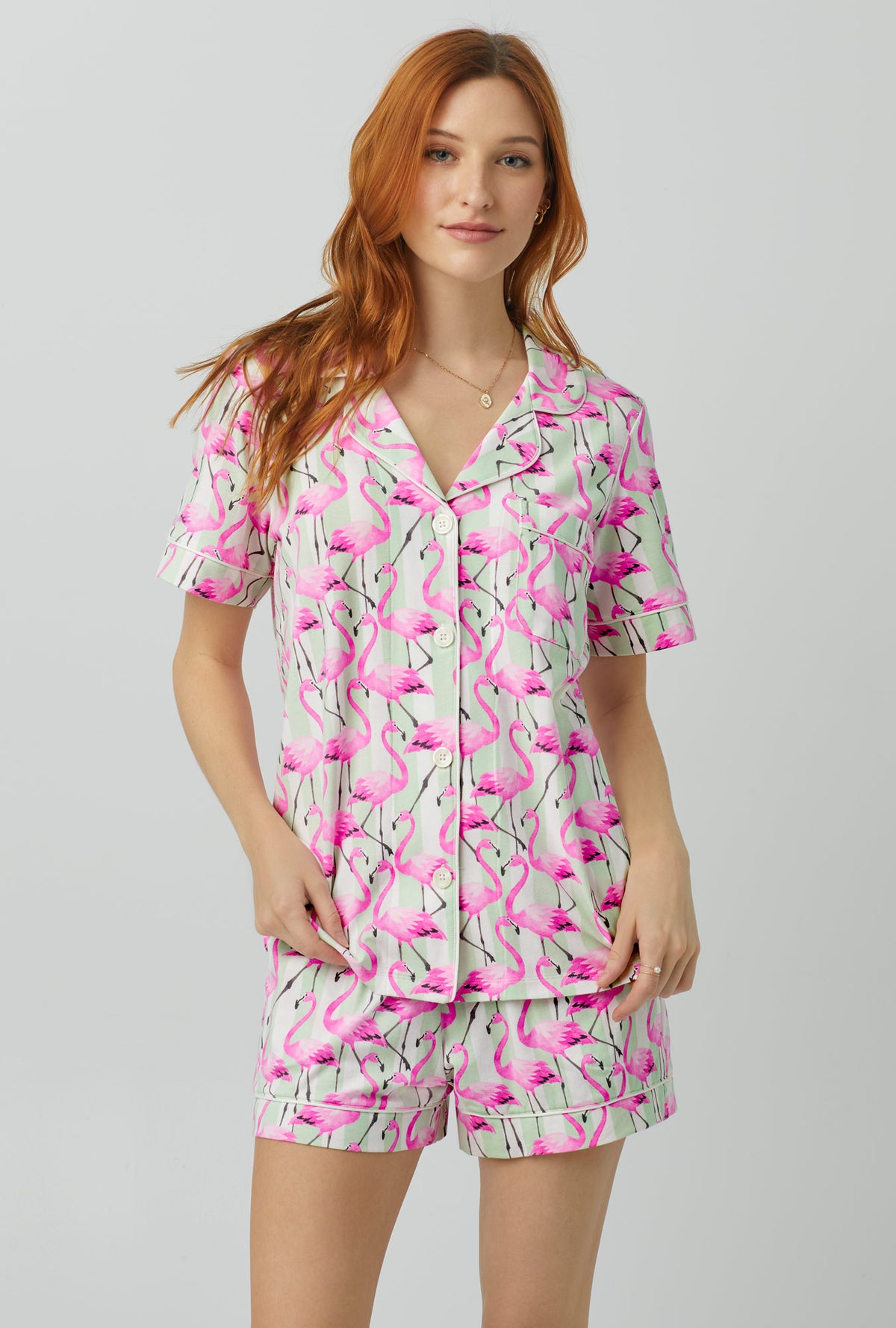 A lady wearing pink Short Sleeve Classic Shorty Stretch Jersey PJ Set with Flamingo Bay print