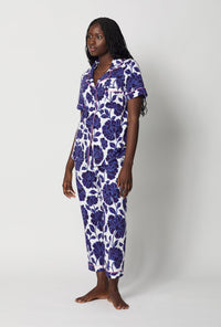 A lady wearing Blue and  White Short Sleeve Classic Stretch Jersey Cropped Pj Set side view