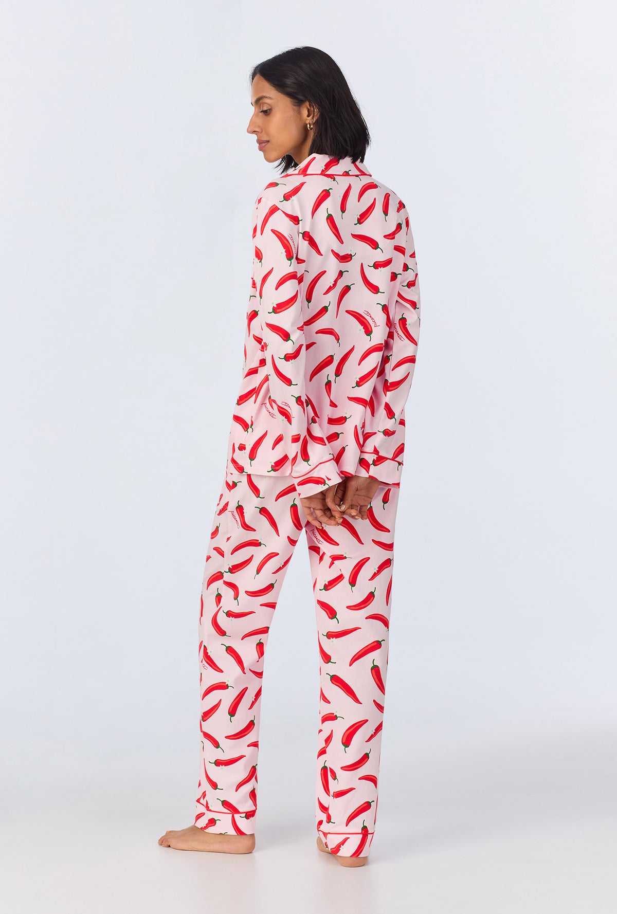 A lady wearing Coming In Hot Long Sleeve Classic Stretch Jersey PJ Set